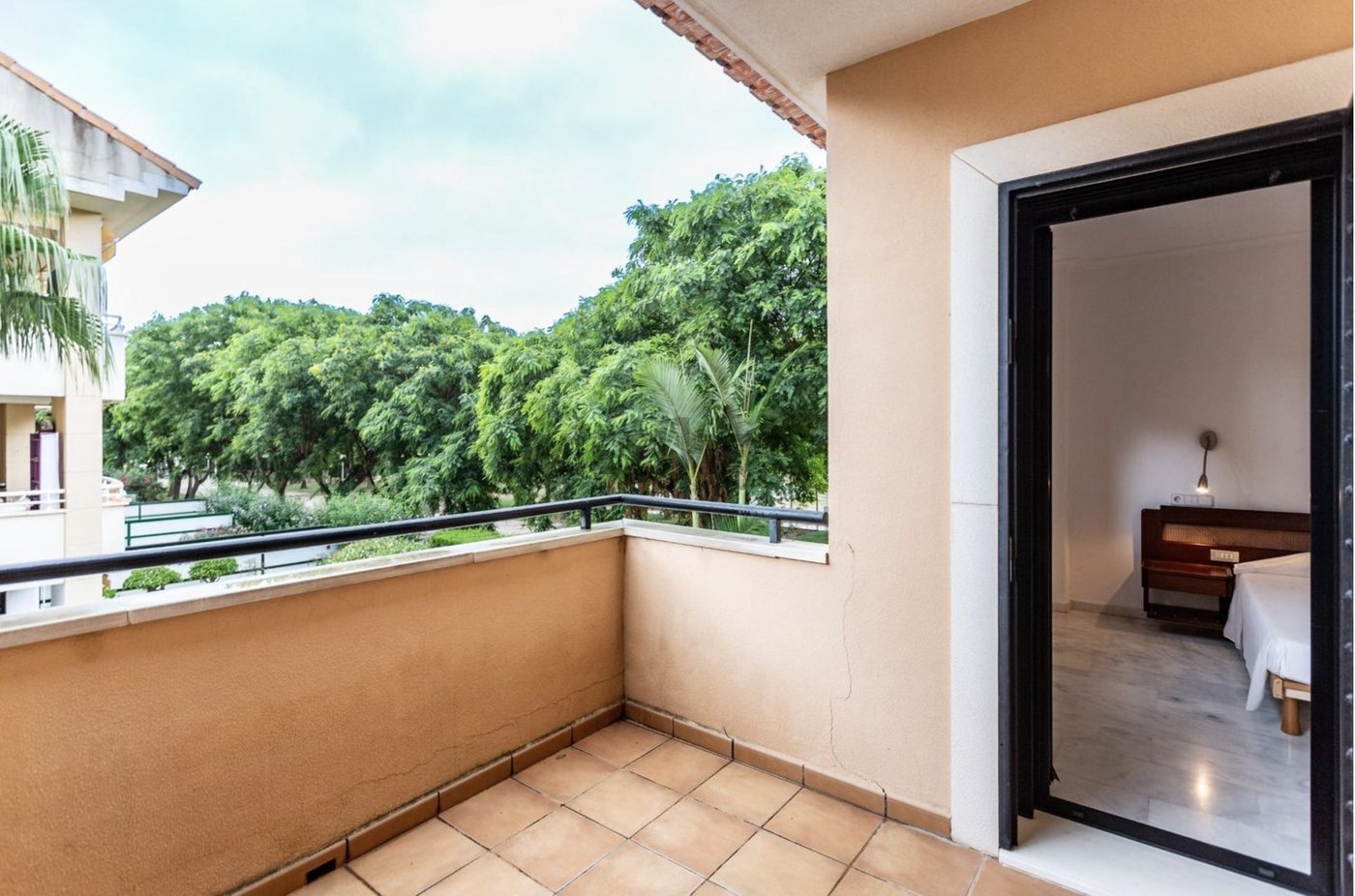 Balcony overlooking park